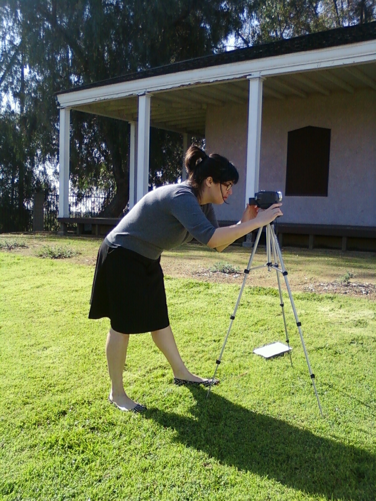 Person with Camera tripod
